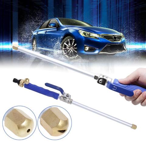 High-pressure electric water gun washer in use, spraying water for garden cleaning on a car."